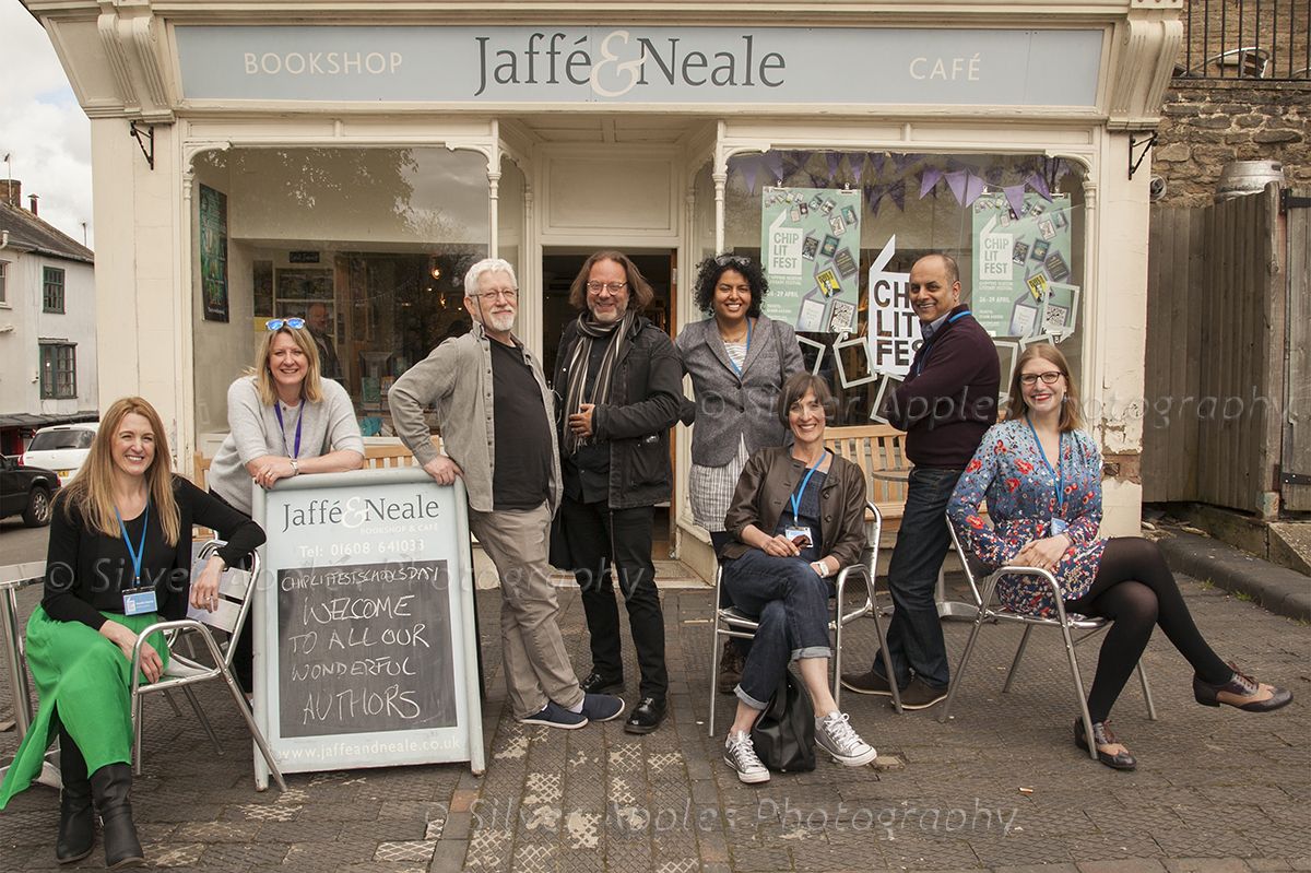 Group photographs; eight authors at a literary festival